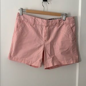 Light pink shorts.